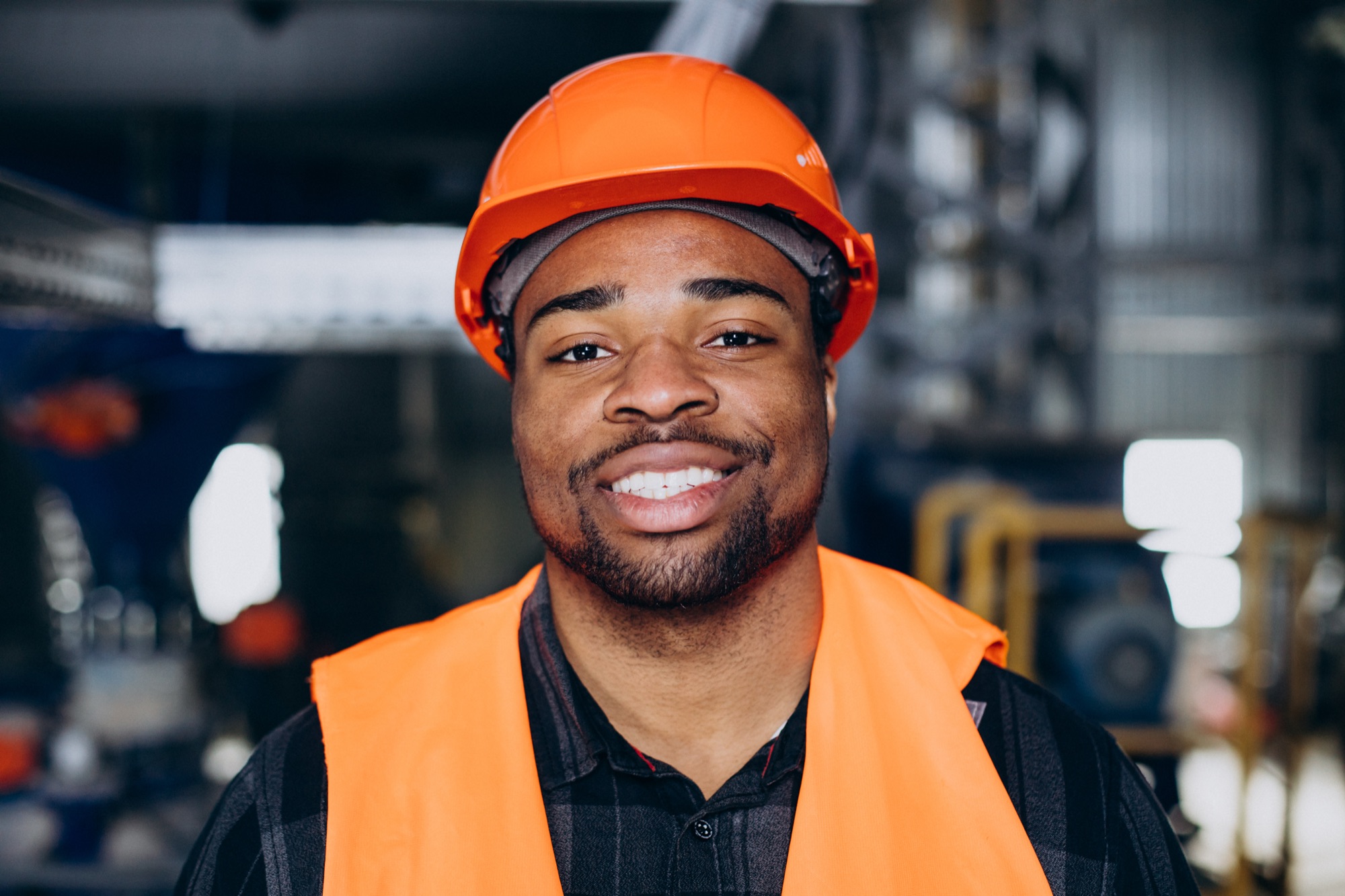 A contractor on a factory floor